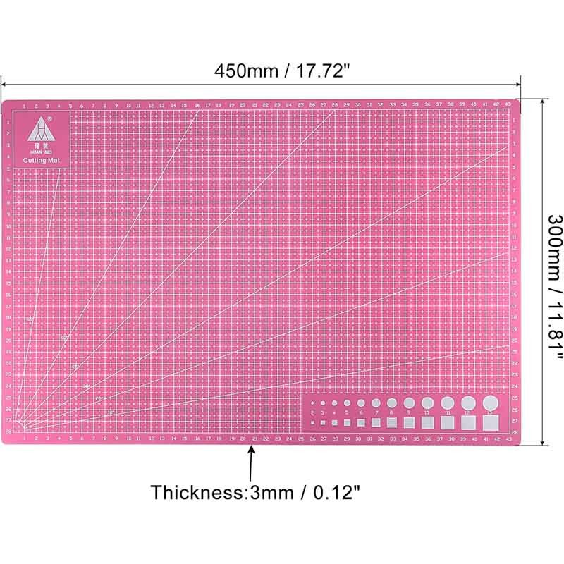 Tapete de corte rosa A3 en uso sobre mesa de trabajo