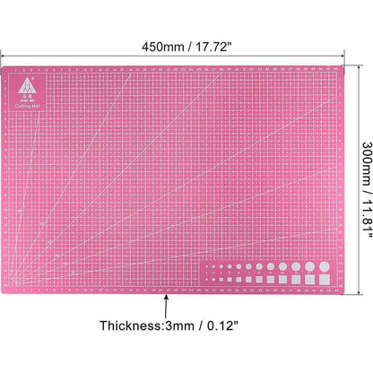 Tapete de corte rosa A3 en uso sobre mesa de trabajo
